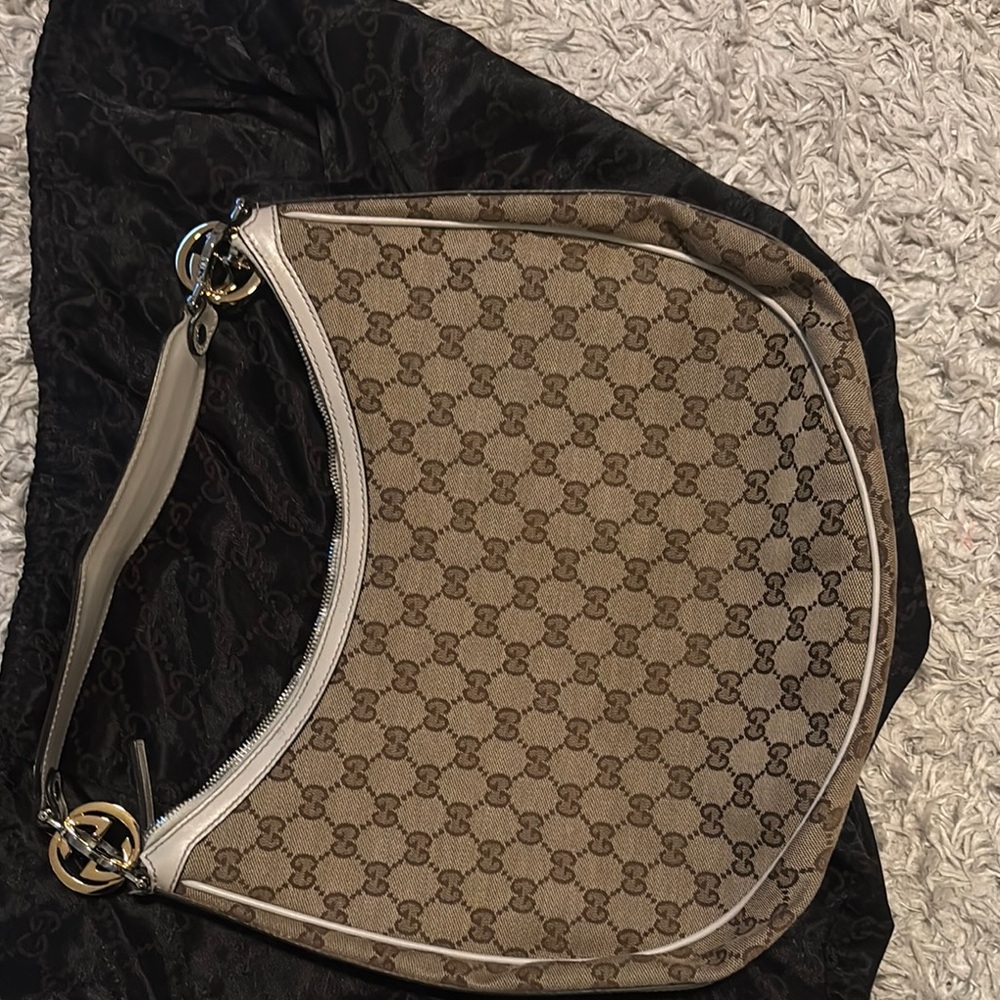 Gucci Brown Shoulder Bag with Monogram Pattern and Hobo Shape